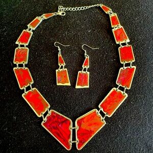 Beautiful, matching red necklace and earrings and silver